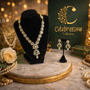 Elegant Polki Pendant Necklace Set with Emerald Green Accent & Matching Earrings