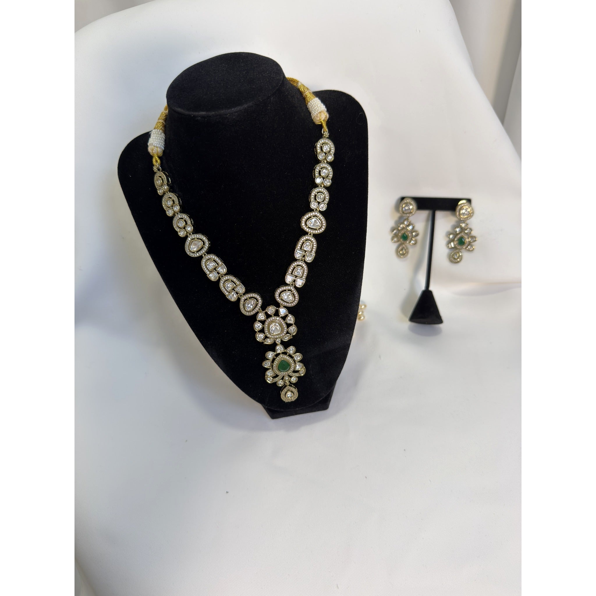 Elegant Polki Pendant Necklace Set with Emerald Green Accent & Matching Earrings