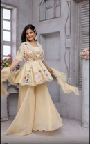 Beige color peplum with it gazal gupta culture hand work touch on it with pure crape palazo