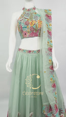 Lehenga Choli in Viscose Organza with Embroidered Detailing and Dupatta
