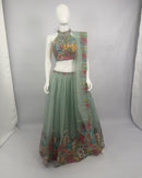 Lehenga Choli in Viscose Organza with Embroidered Detailing and Dupatta