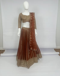Designer Lehenga Choli in Georgette with Intricate Embellishment